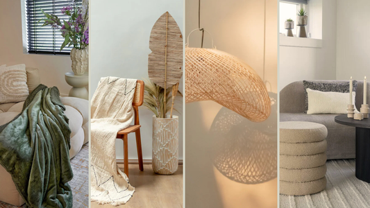 Woonkamerhoek met plaid op fauteuil, houten stoel met crème kleed, rotan hanglamp en zachte kussens op bank, natuurlijke woonaccessoires en styling inspiratie van Luben.