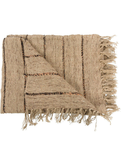 Beige handgeweven plaid met zwarte strepen en franjes – natuurlijke woondeken van katoen en jute.