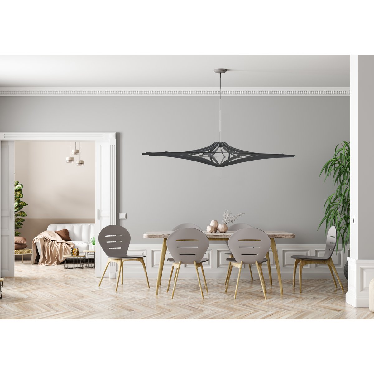 Grote zwarte MDF hanglamp met moderne, geometrische vorm en open structuur in een modern interieur. Een opvallend designstuk dat perfect past boven een eettafel of in een ruime woonkamer voor een eigentijdse en stijlvolle uitstraling.