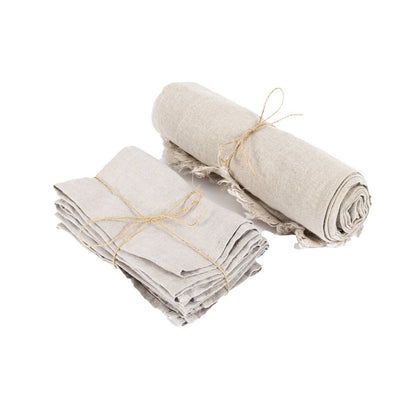 Linnen tafelkleed beige 150x150 cm opgerold en opgevouwen met strikjes eromheen