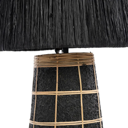 Zwarte lampvoet van terracotta in close-up met matte afwerking