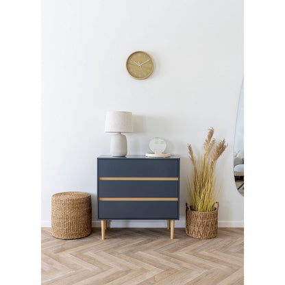 Rivera poef naturel gecombineerd met een dressoir in een minimalistisch interieur